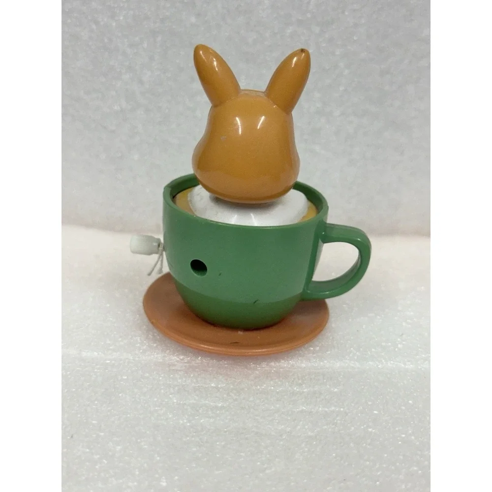 Vtg BUNNY RABBIT IN A CUP Wind-Up Walking Toy Working Twirls & Slides China AZS